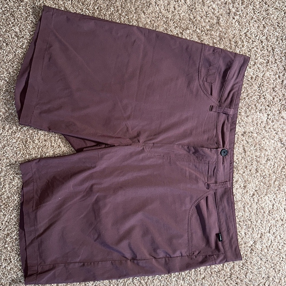 Travis Mathew 38 red shorts